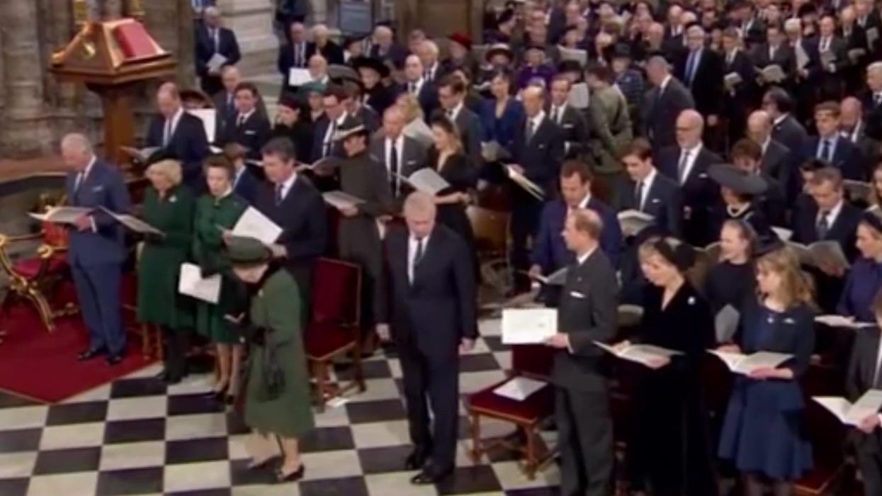 Andrew makes surprising public appearance arm-in-arm with teary Queen at memorial service