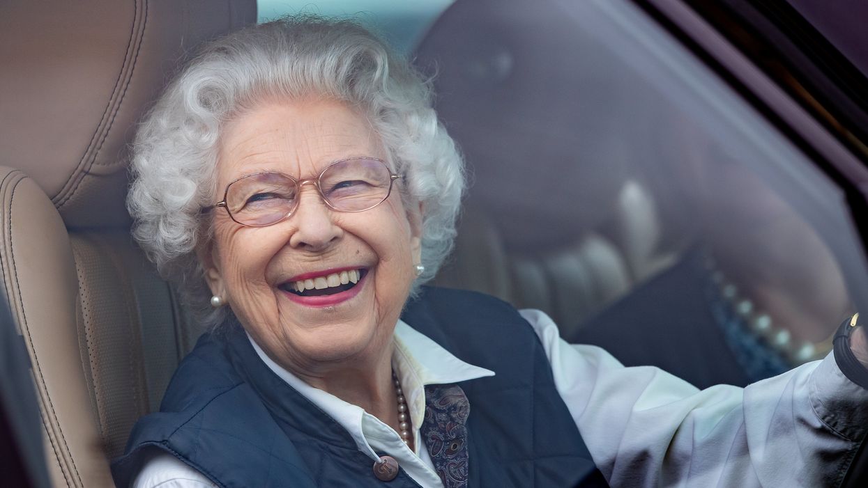 <p>Queen Elizabeth II seen driving her Range Rover car as she attends day 2 of the Royal Windsor Horse Show in Home Park, Windsor Castle</p>