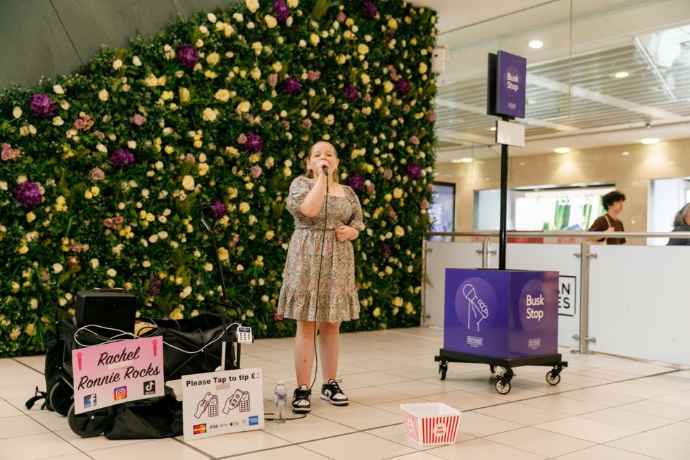 Rachel Ronnie performing at the Busk Stop