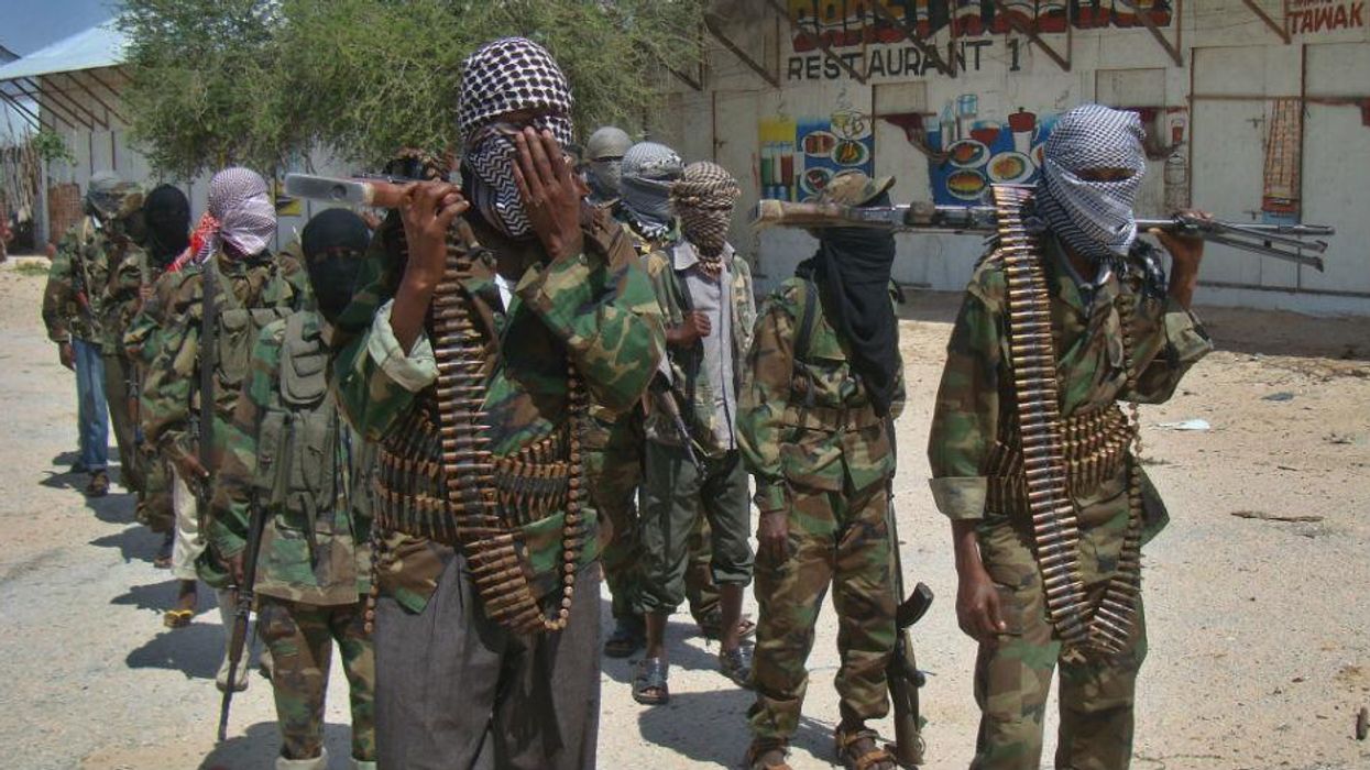 Recruits from al-Shabaab, one of the groups who have benefited from kidnapping, pose in the Somali capital Mogadishu, 2012