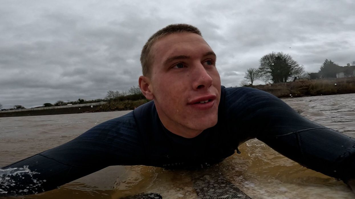 Red Bull's Tom Bridge joined surfers to ride huge Severn Bore tidal wave