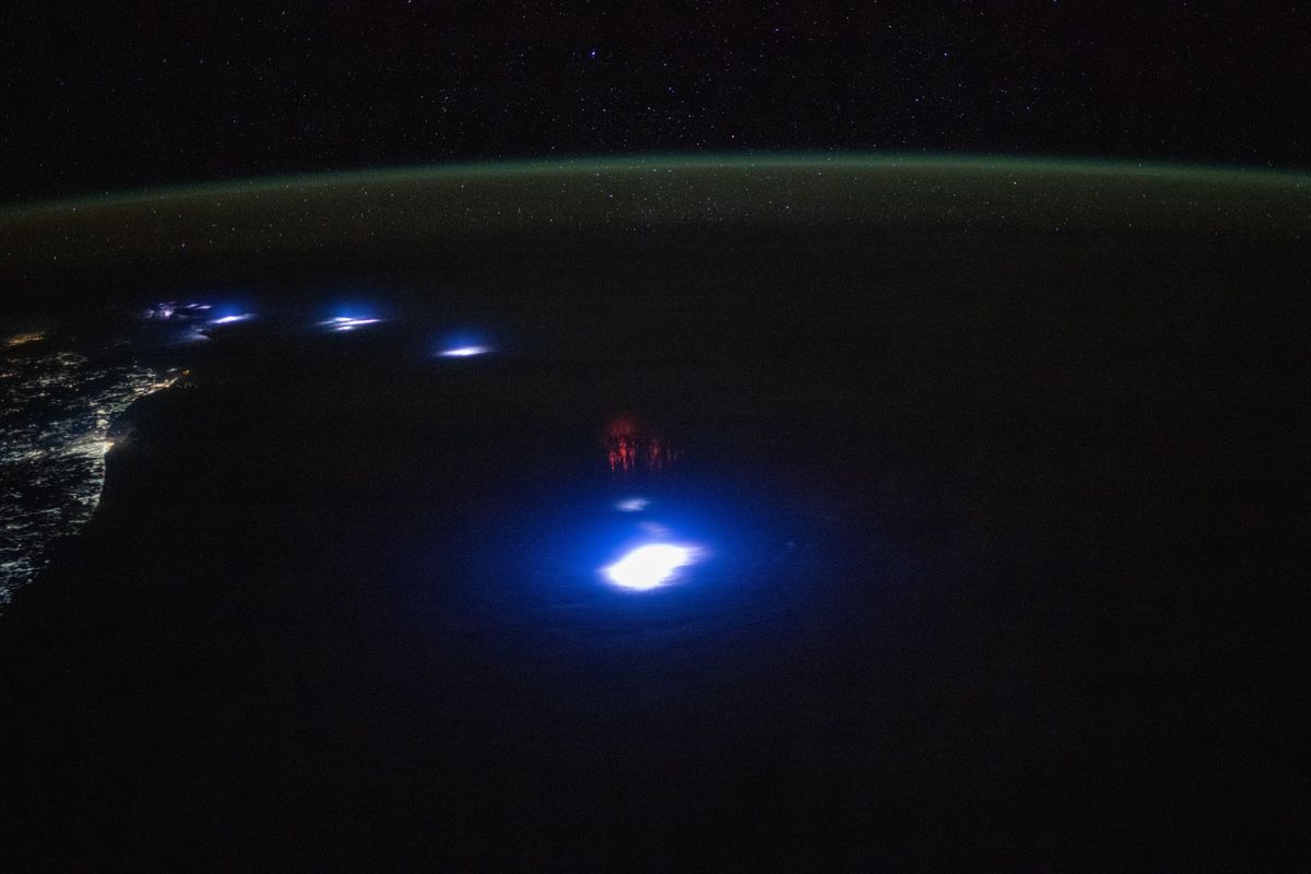 Red sprite TLEs photographed from the International Space Station (ISS) above a storm in South Africa