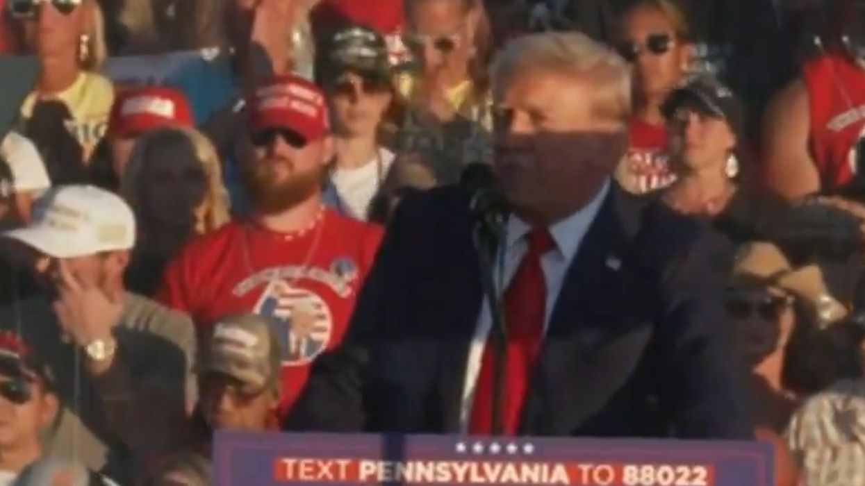 QAnon conspiracy theorist makes bizarre speech about raw milk at Donald Trump rally
