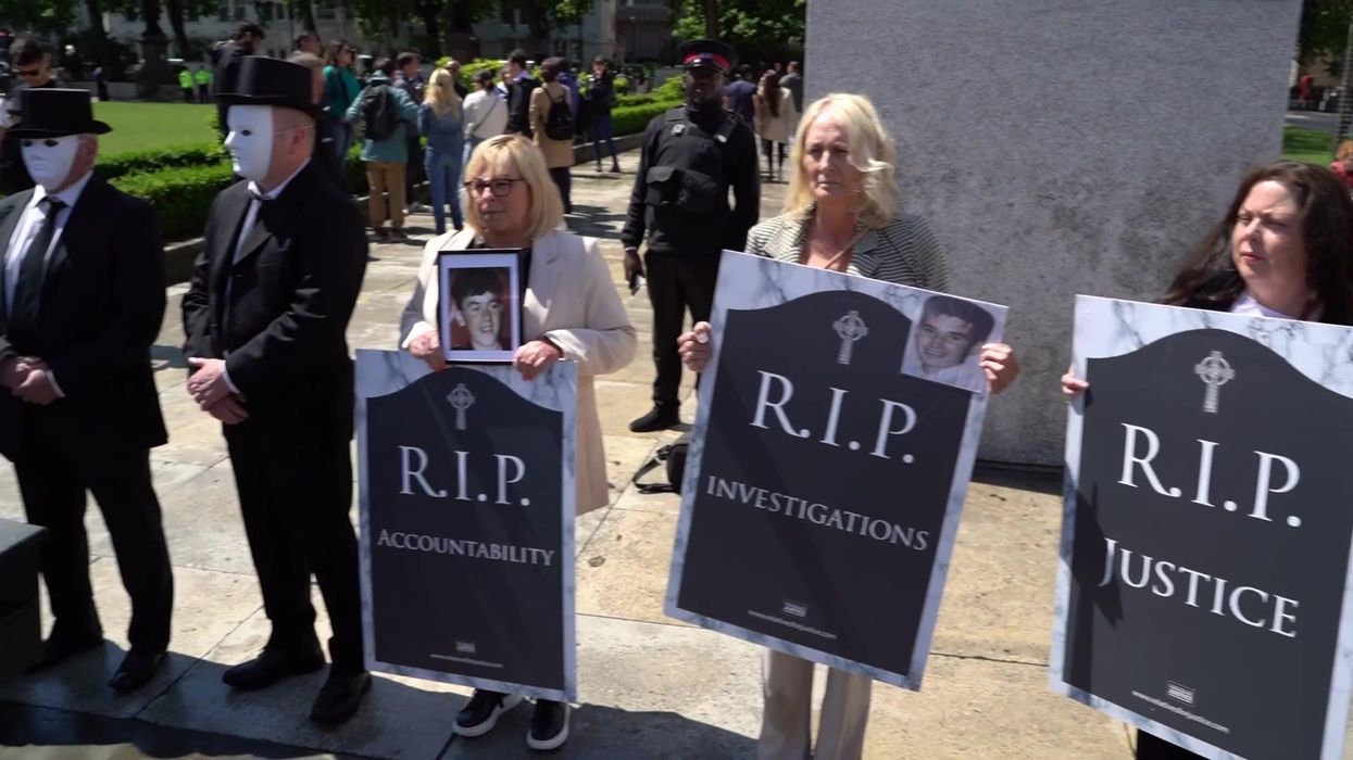 Eerie clip sees relatives of Troubles victims carry coffin to Downing Street in protest