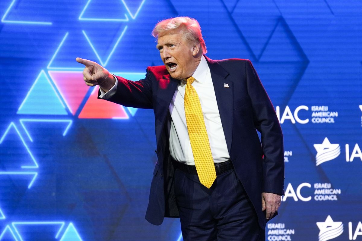 Republican presidential nominee former President Donald Trump acknowledges the crowd after speaking at the Israeli American Council National Summit, Thursday, Sept. 19, 2024, in Washington