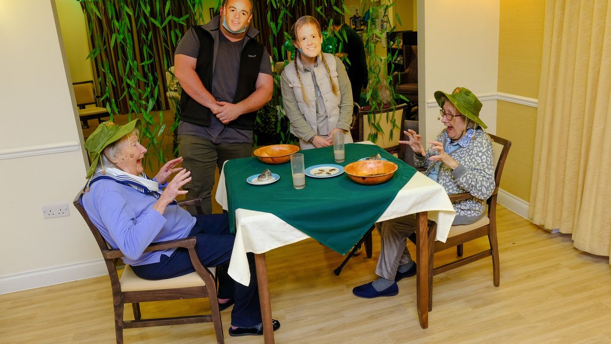 Residents Doreen Barber, 96, and Mary Tierney, 92, take part in a bushtucker trial at Care UK’s Mountfitchet House care home (Care UK/PA)