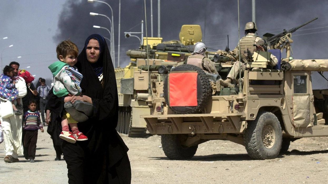 Residents fleeing the Iraqi city of Basra in March 2003