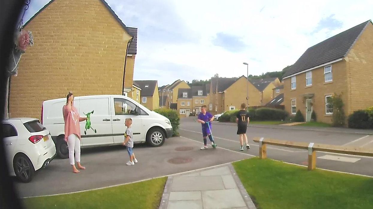 Ring camera catches woman getting smacked in the face with her son's scooter