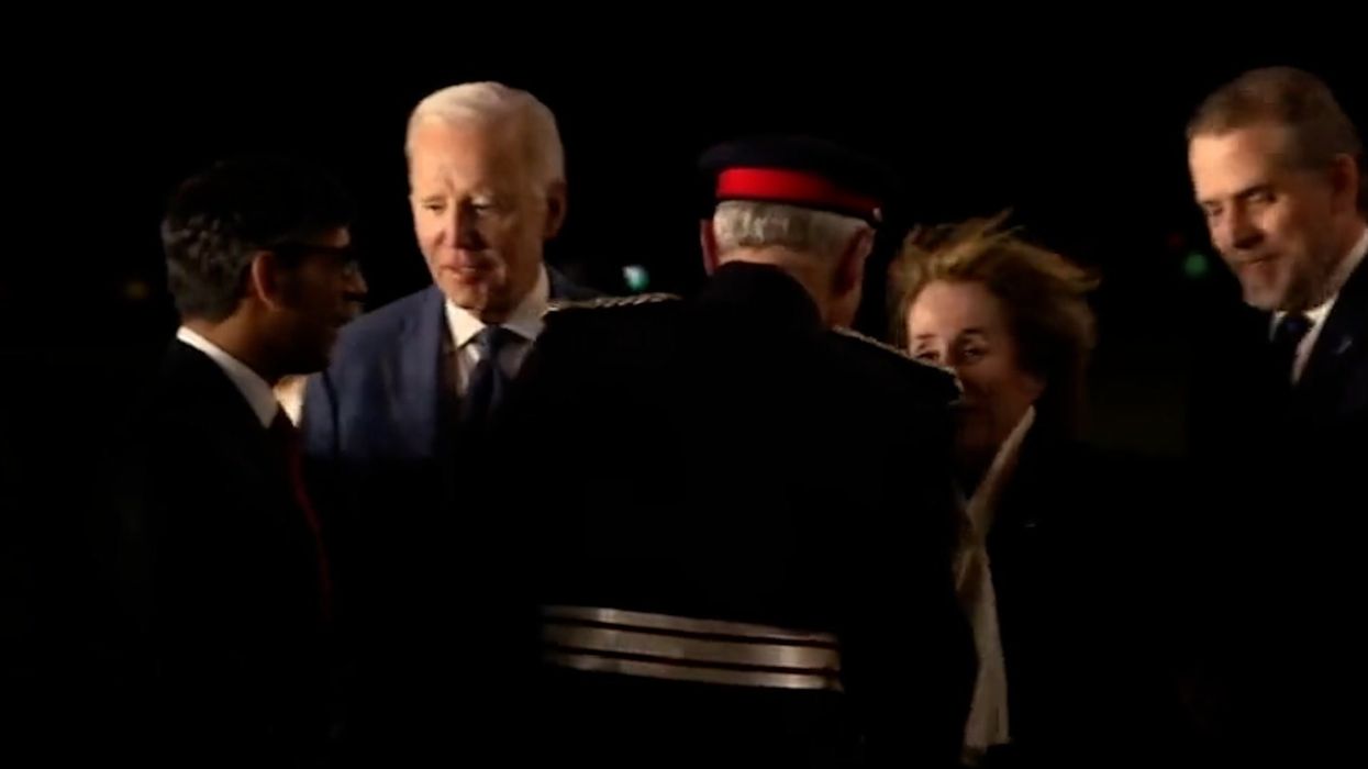 Joe Biden appears to push Rishi Sunak out of way as he lands in Ireland
