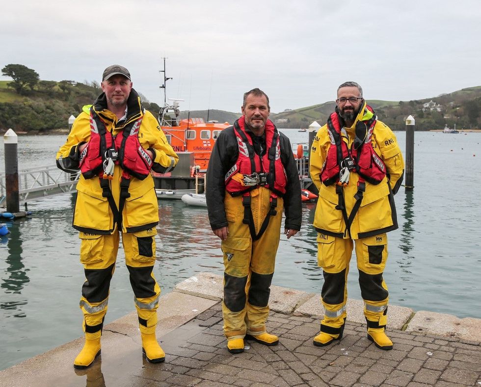RNLI crew members Richard Clayton (L) and Iain Dundas (R) and Coxswain Chris Winzar (centre) (RNLI Salcombe)