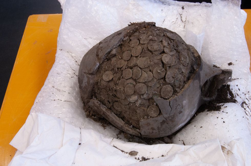 Roman coins found in a pot in Wickwar (British Museum/PA)