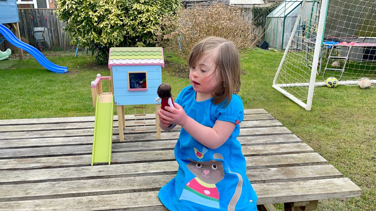 Rosie Barnett, 6, with a new Lottie Dolls toy that is inspired by her