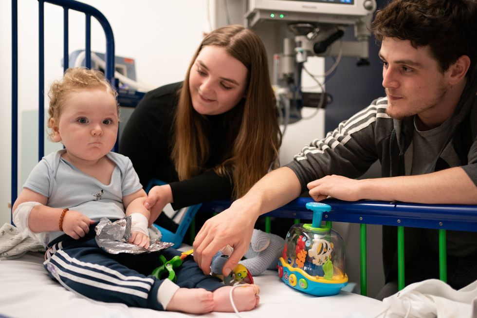 Rosie-Mae Walton and Wes Powell said their son Marley appears to be doing really well after the treatment (Joe Giddens/PA)
