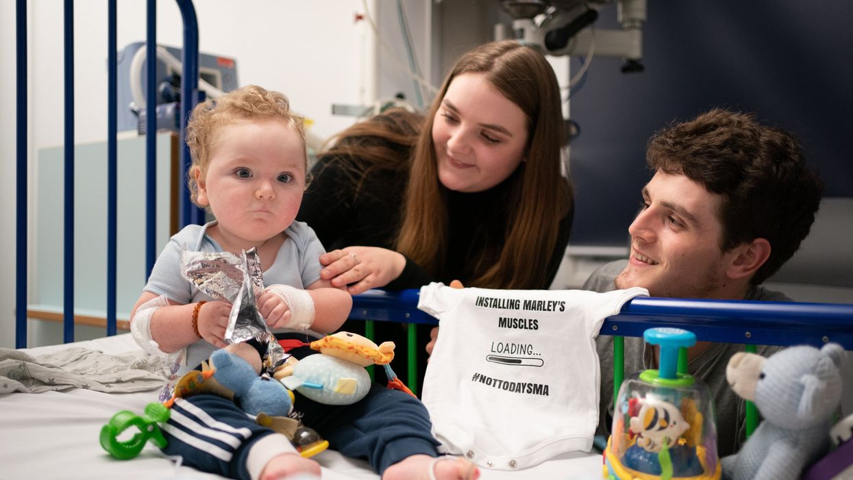Rosie-Mae Walton and Wes Powell with their son Marley as he recovers at Sheffield Children’s Hospital after receiving the ;most expensive drug in the world;, the genetic treatment Zolgensma (Joe Giddens/PA)