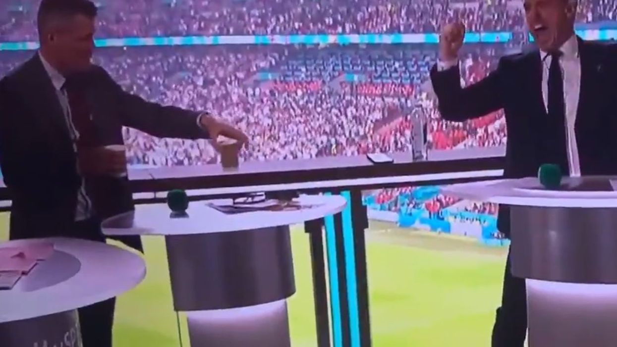 <p>Roy Keane appeared more concerned about drinks spilling than the early England goal</p>