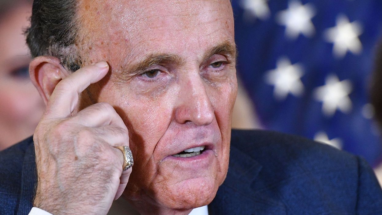 Rudy Giuliani speaks during a press conference at the Republican National Committee headquarters in Washington, DC, on 19 November 2020