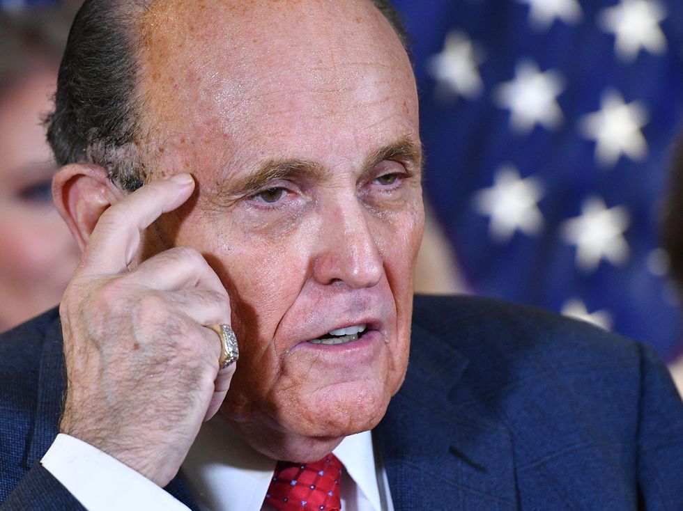 Rudy Giuliani speaks during a press conference at the Republican National Committee headquarters in Washington, DC, on 19 November 2020