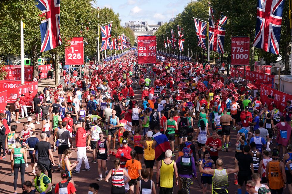 Runners after finishing the Virgin Money London Marathon (PA)