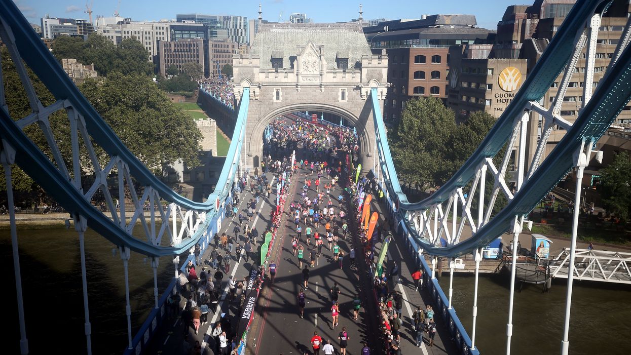 Runners cross over Tower Bridge during the Virgin Money London Marathon (Steven Paston/PA)