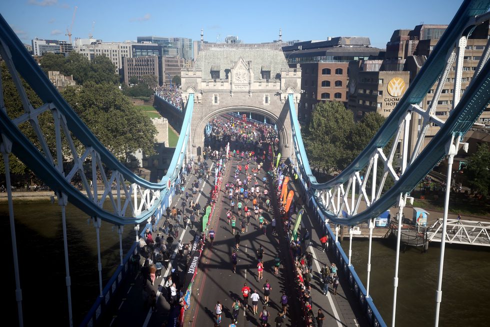 Runners cross over Tower Bridge (Steven Paston/PA)