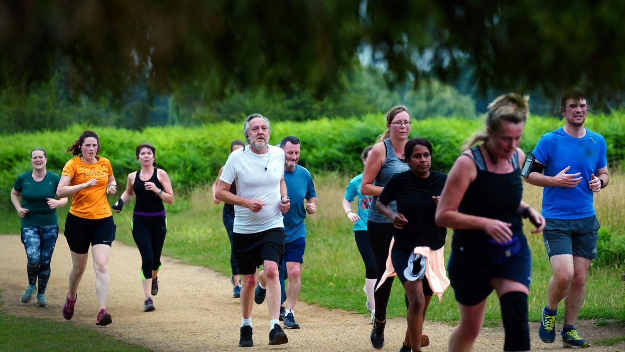 Runners taking part in the Parkrun at Bushy Park in London, the largest and oldest Parkrun in the UK, and one of many runs taking place across the country for the first time since last March. Picture date: Saturday July 24, 2021.