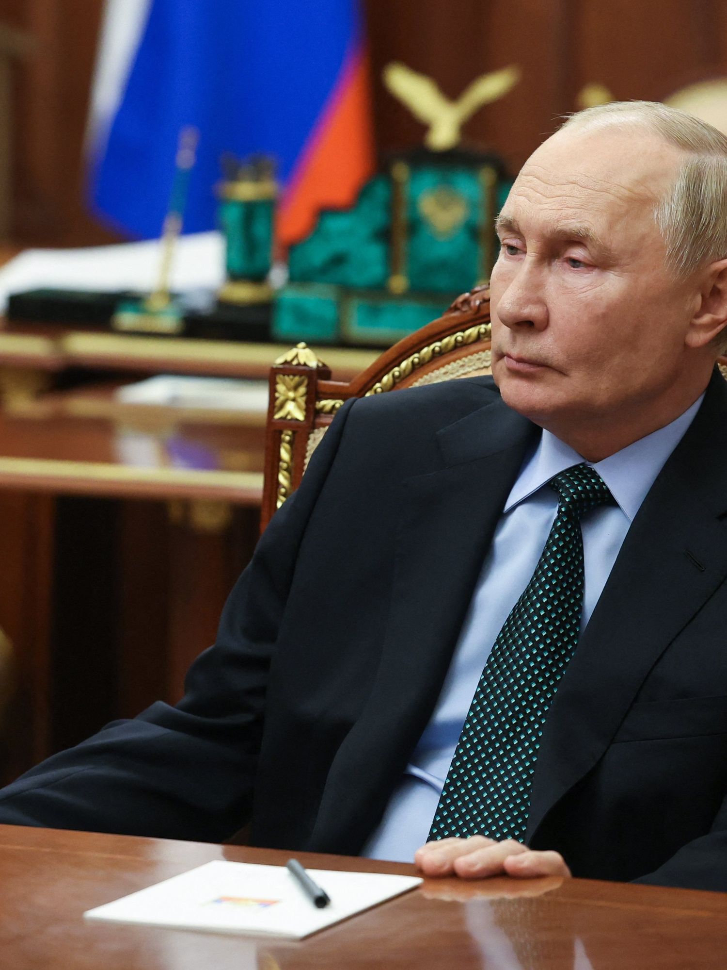 Russia's President Vladimir Putin meets with Yevgeny Balitsky (not pictured), the Moscow-installed head of the Zaporizhzhia region of Ukraine, at the Kremlin in Moscow on November 18, 2024