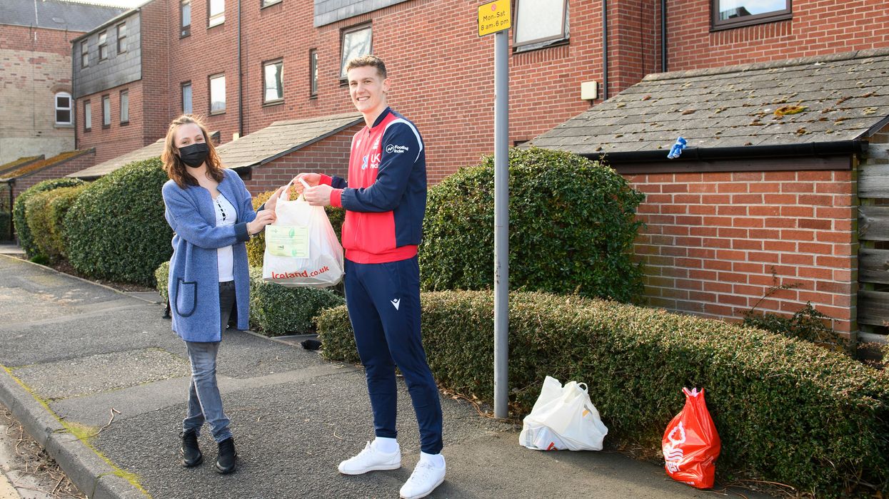Ryan Yates of Nottingham Forest delivered the one millionth EFL food parcel to Sandie Gee – Husbands