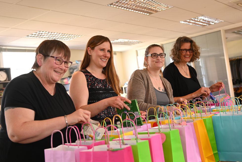 Lottery-winning mums help out at crisis charity