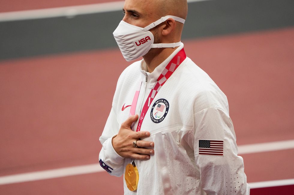 Sam Grewe won gold in the T63 Paralympic high jump (Eugene Hoshiko/AP)