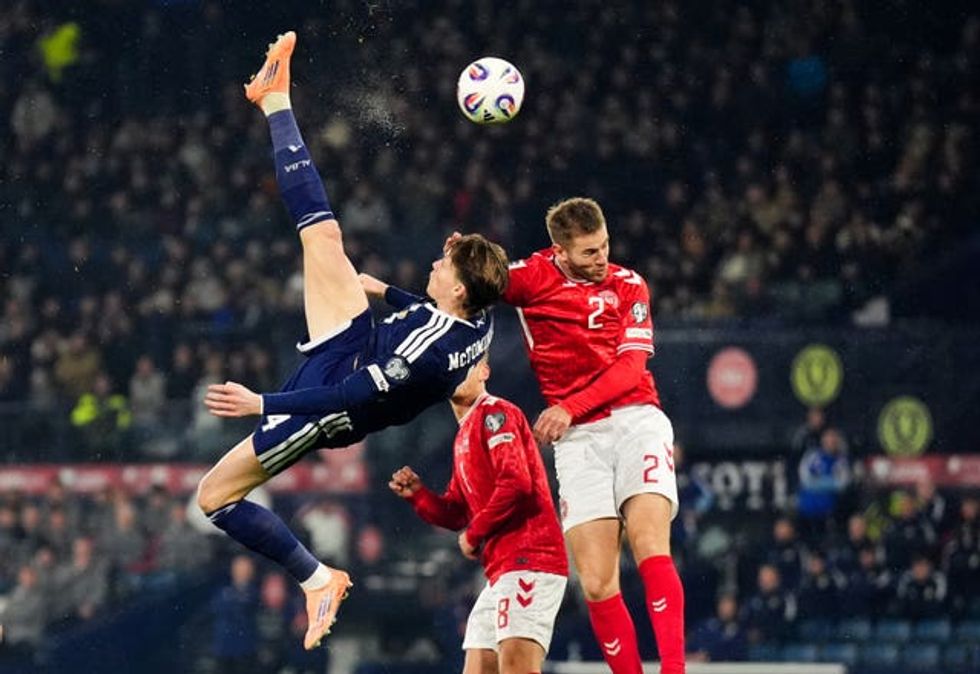 Scotland\u2019s Scott McTominay scores the opening goal during the win over Denmark