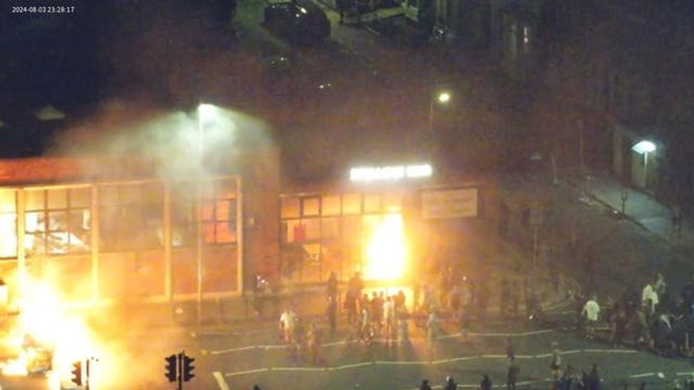 Screengrab taken from CCTV footage of the fire at the Spellow hub on August 3