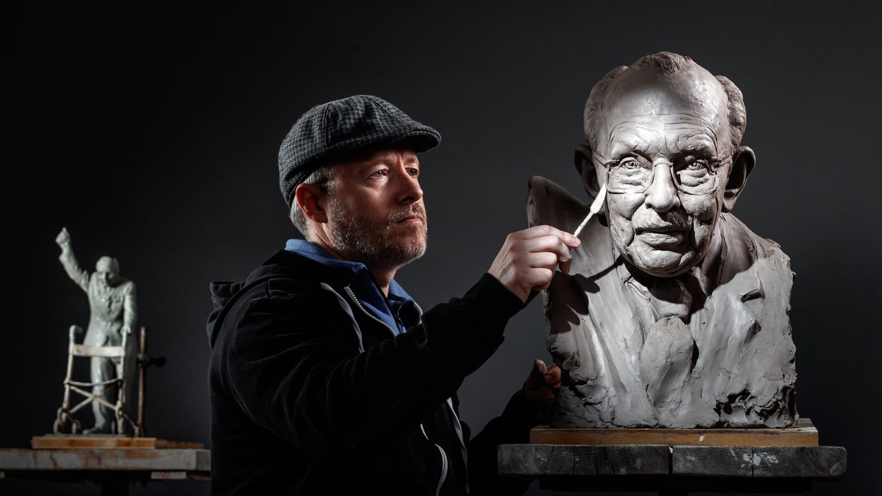 Sculptor Andrian Melka at his studio in York, working on a clay portrait of Captain Sir Tom Moore