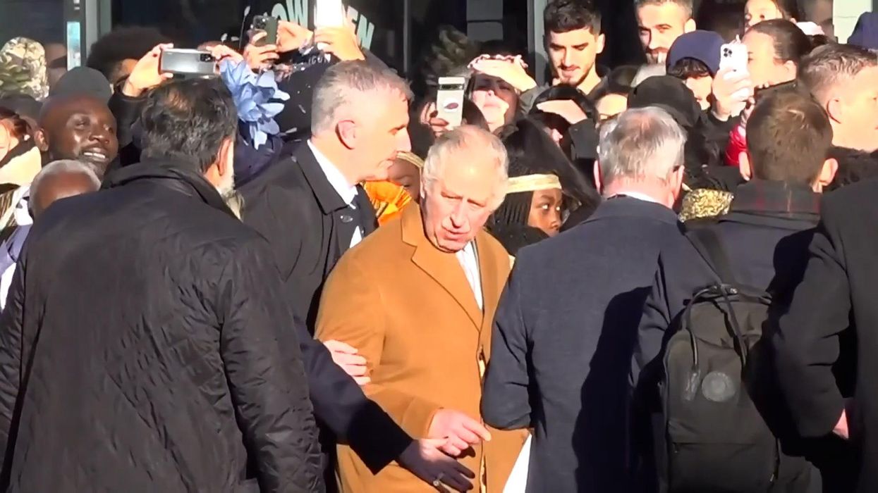 Security surround King Charles after he gets 'egged' once again