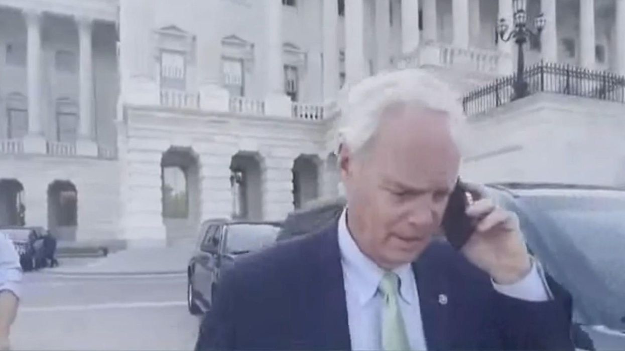 Republican Senator caught out attempting to avoid reporters by 'pretending to be on a call'