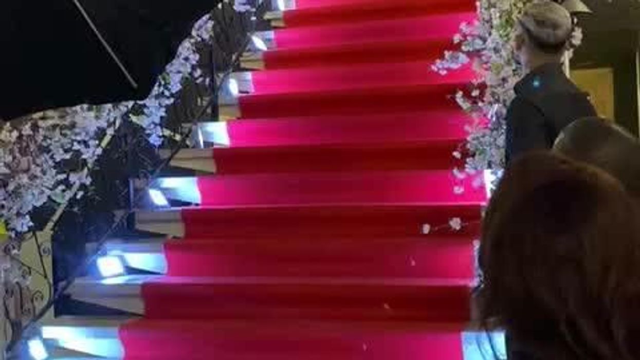 Woman paid $100 for graduation pics then found it on cover of soft-core sex novel