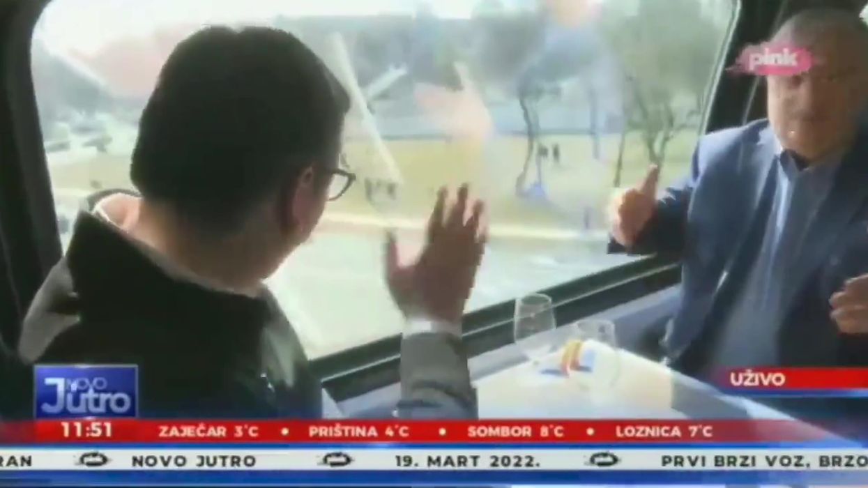 Serbian president goes viral for waving at non-existent crowd in photo op