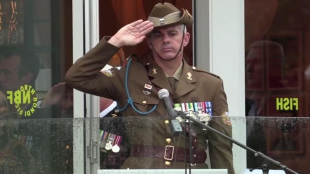 Serviceman accidentally swears at kids in front of huge crowd after forgetting microphone is on