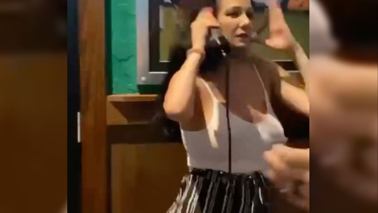 <p>She came well-prepared for her trip to a local bar</p>