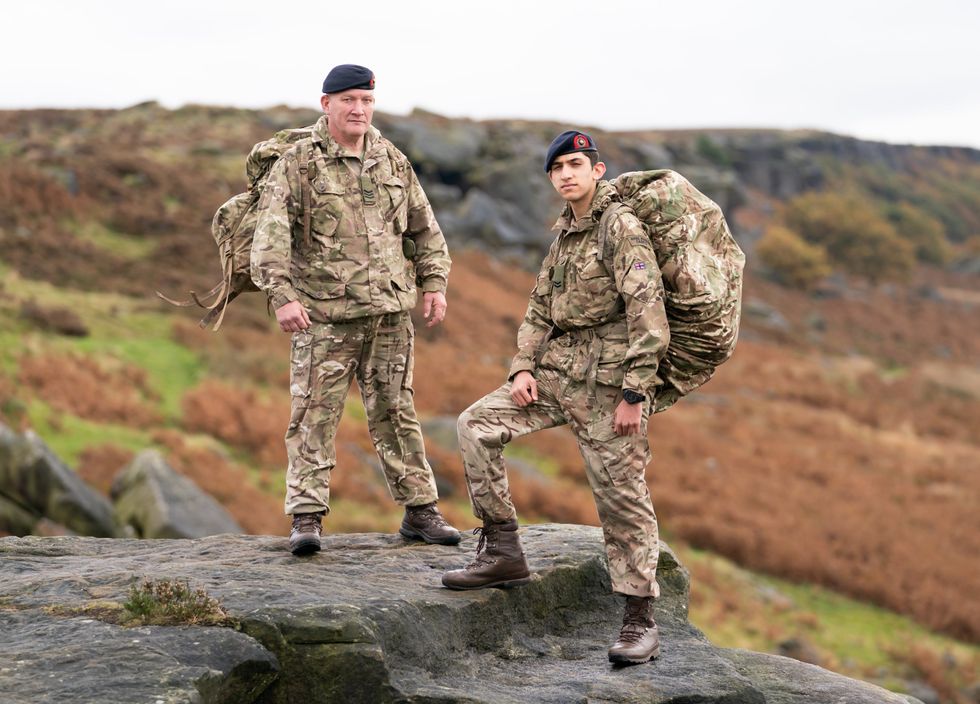 Sheffield Royal Marines Cadets detachment commander Sgt John Daley (left) with Sal (Danny Lawson/PA)