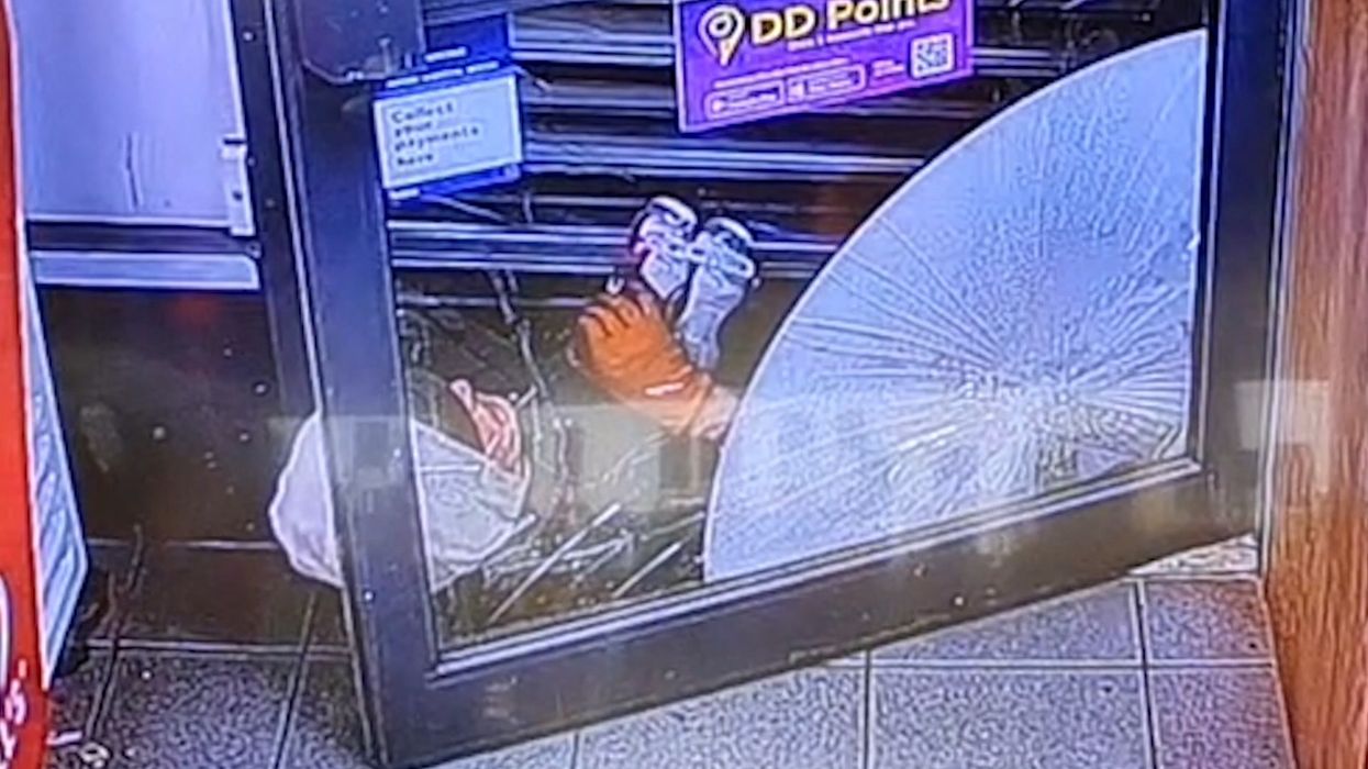 Armed robber steals cans of lager only to be left trapped by quick thinking shopkeeper