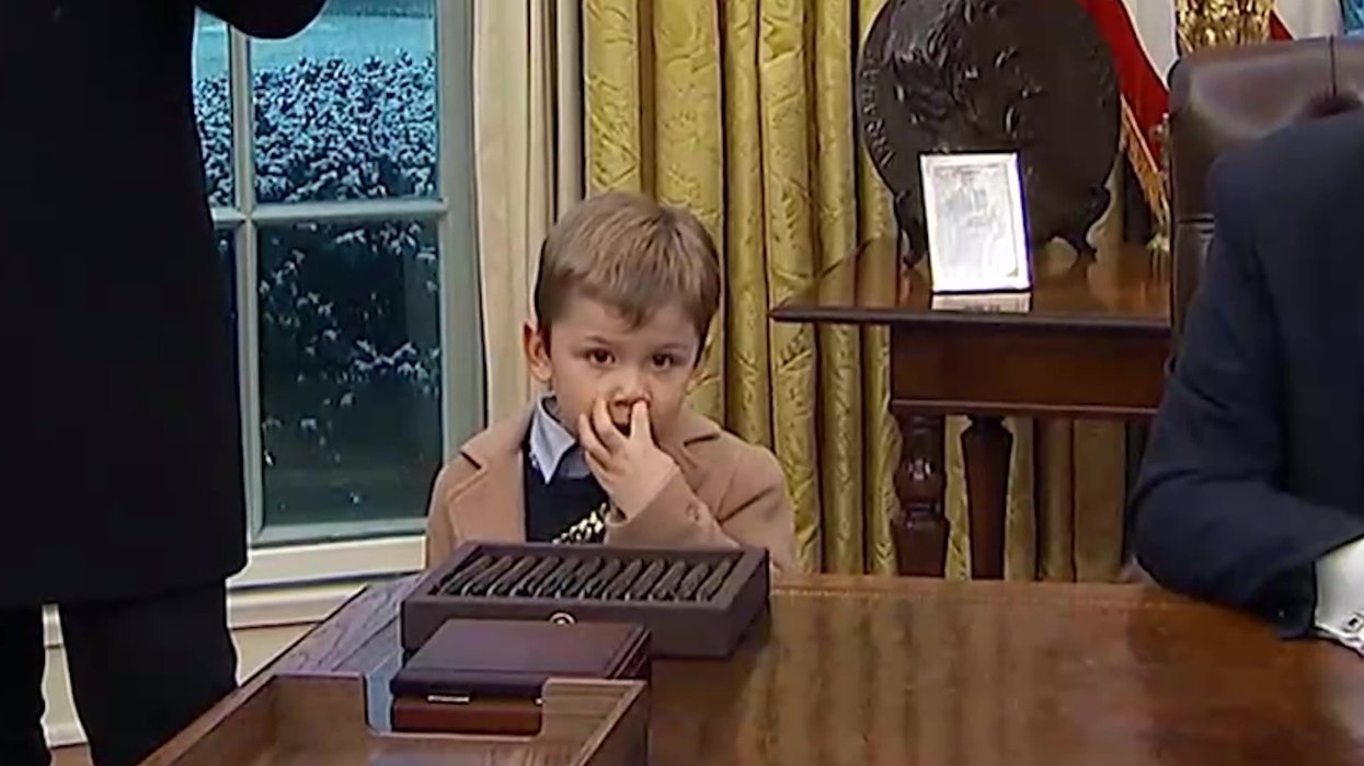 Donald Trump 'babysitting' Elon Musk's son in the Oval Office becomes