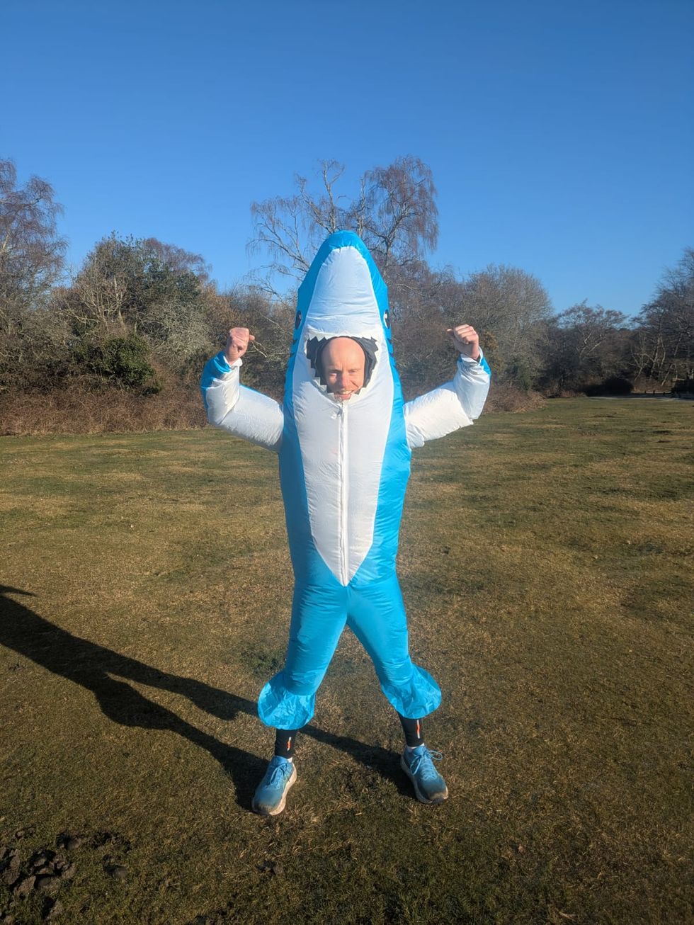 Simon Heylar in a shark outfit