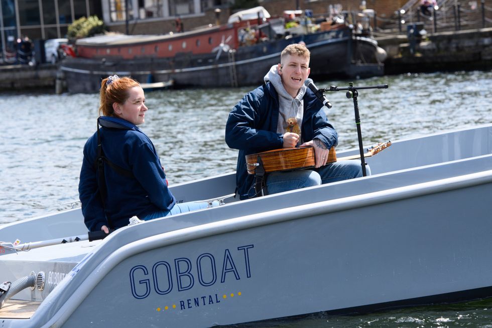 Singer Nathan Evans, who went viral on TikTok with his sea shanty Wellerman, performs on board a GoBoat on the River Thames (Matt Crossick/PA)