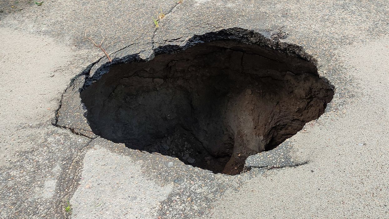 Sinkhole that led to man's disappearance in 2013 reopens