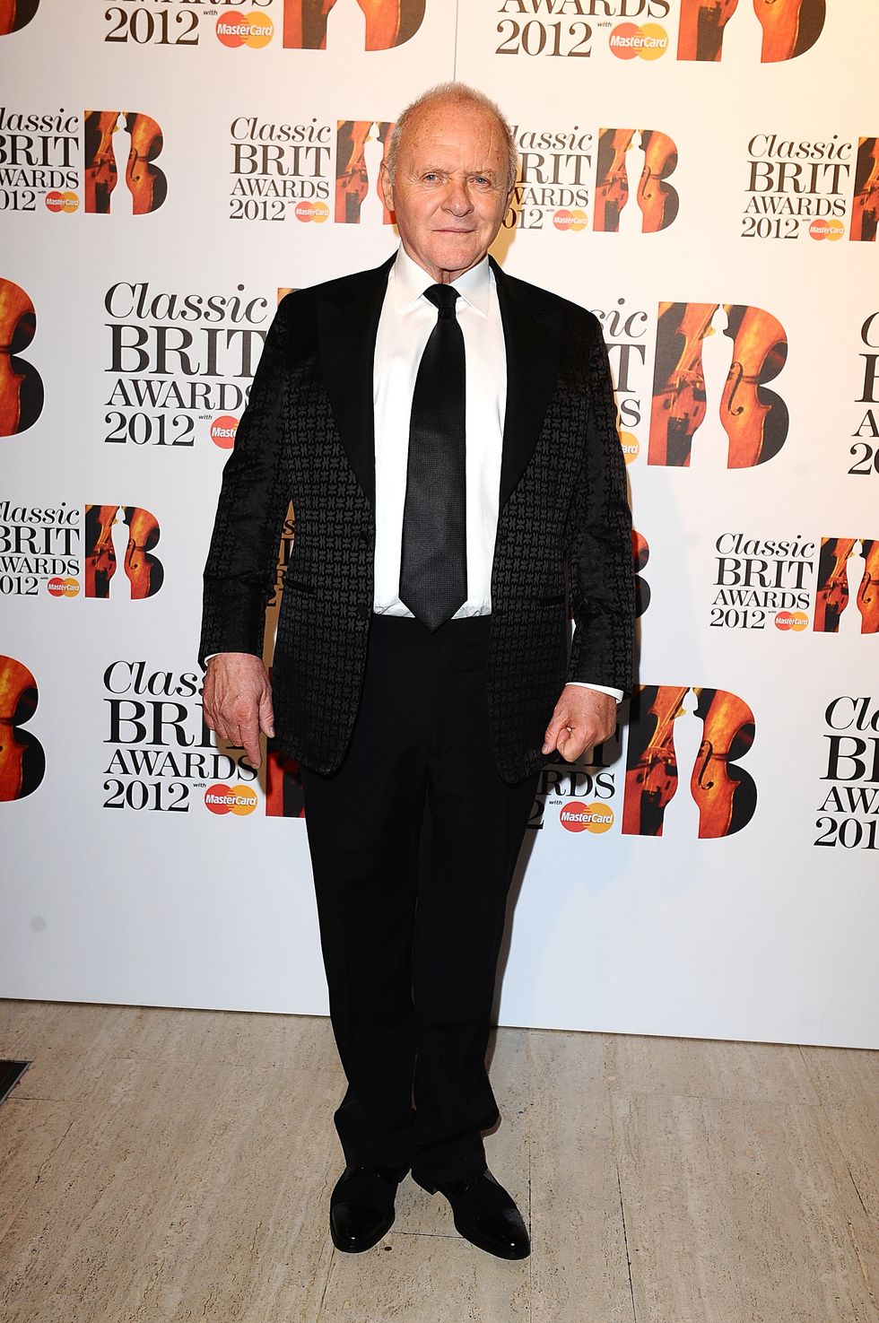 Anthony Hopkins channels Hannibal Lecter while wearing Skims face wrap