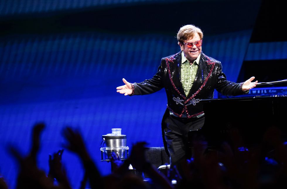 Sir Elton John greets Manchester City’s FA Cup winners at airport