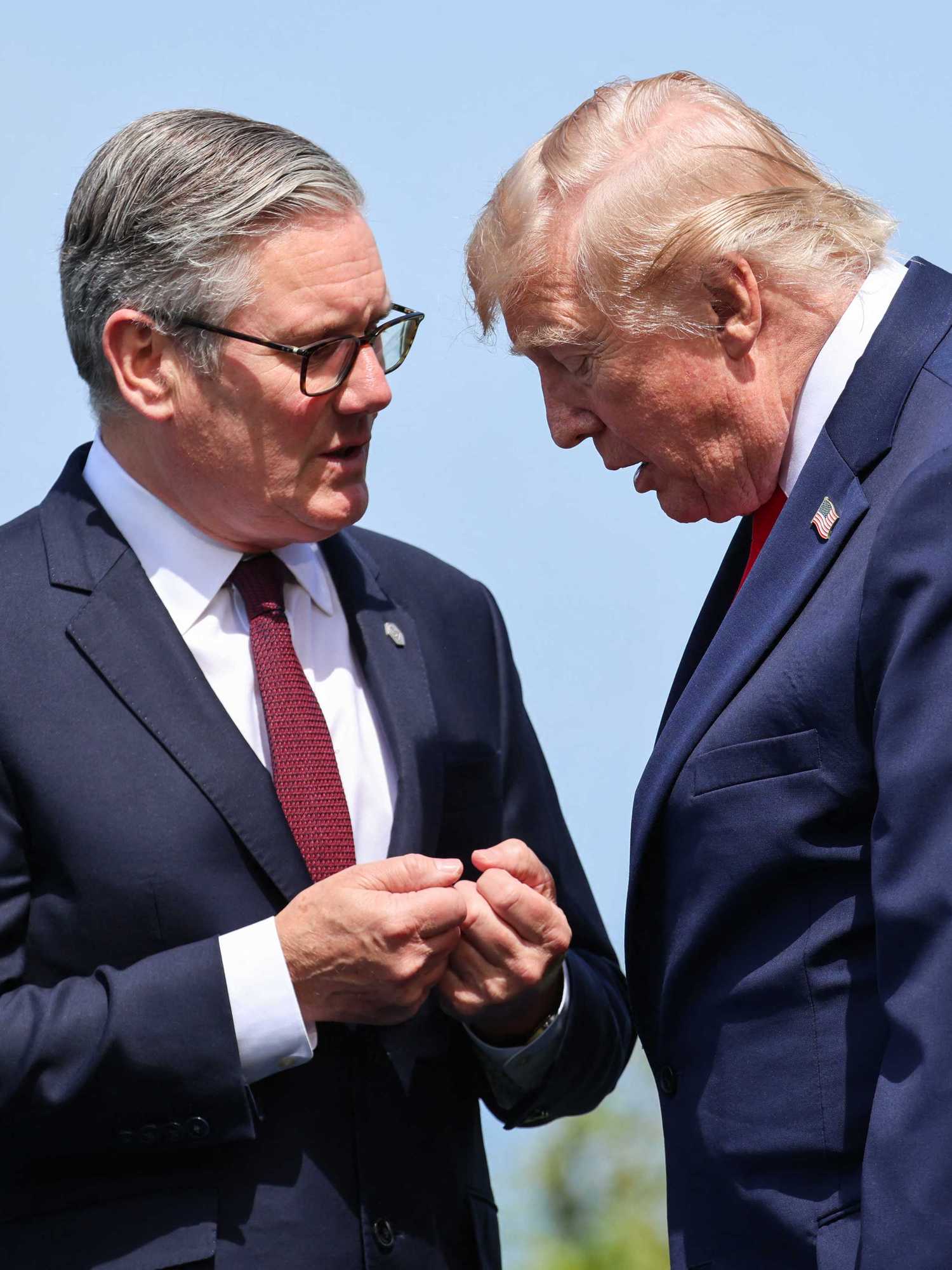 Sir Keir Starmer and Donald Trump talk to each other at the G7.