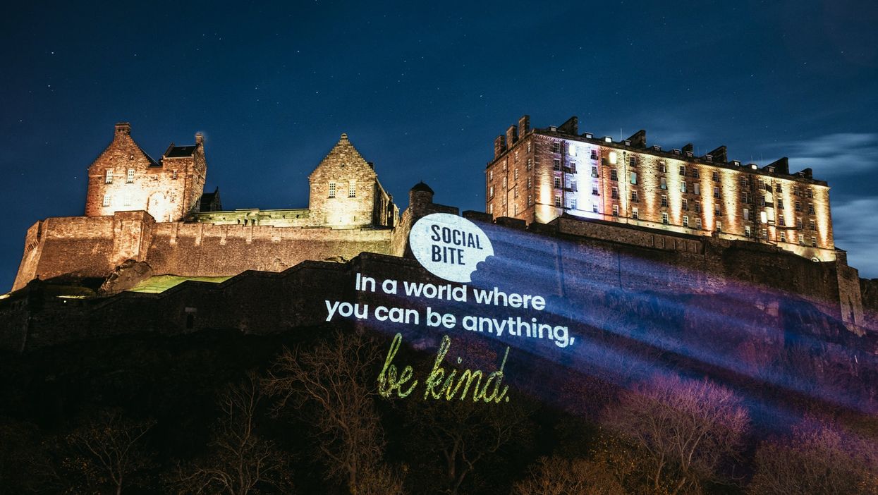 Social Bite’s projection on the cliffs below Edinburgh Castle (Social Bite)