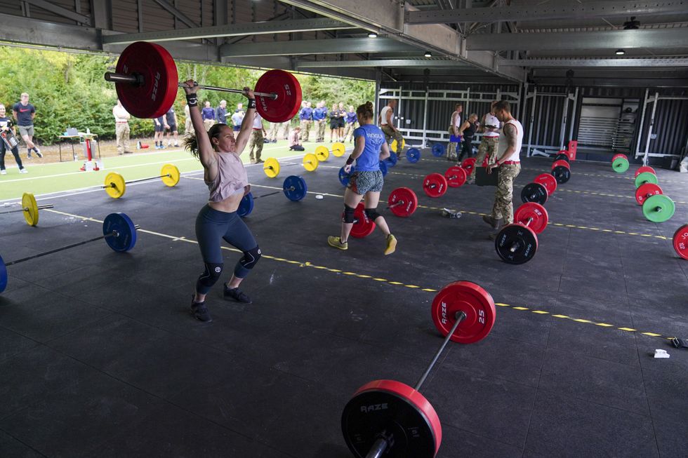 Soldiers compete in the weightlifting task (Steve Parsons/PA)