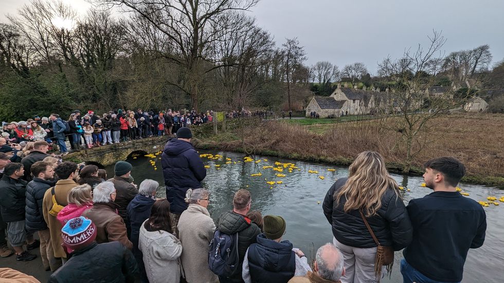 3,000 rubber ducks take to river in Cotswolds village for annual race